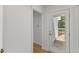 Bright entryway with built-in cabinets and a glass-paneled door allowing natural light at 6709 Sunhaven Pl, Raleigh, NC 27615