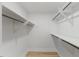 This is a walk-in closet with ample shelving for clothing and accessories at 6709 Sunhaven Pl, Raleigh, NC 27615