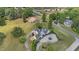Beautiful aerial showcasing the house and its surroundings including an additional building at 70 S Patterson St, Coats, NC 27521