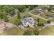 Aerial view showing an exceptional property surrounded by nature and mature trees at 70 S Patterson St, Coats, NC 27521