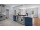 Modern kitchen boasts stainless steel appliances, including chef style oven, island, and great light at 70 S Patterson St, Coats, NC 27521