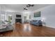 Bright living room featuring hardwood floors, a marble fireplace, recessed lights, and abundant natural light at 70 S Patterson St, Coats, NC 27521