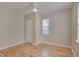Cozy bedroom with natural light and neutral walls at 7024 Beaverwood Dr, Raleigh, NC 27616