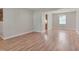 Bright and airy living room with wood floors, perfect for entertaining guests at 7024 Beaverwood Dr, Raleigh, NC 27616