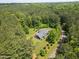 A bird's eye view of the home on a generous wooded lot, with privacy and natural beauty at 741 Sinai Cir, Hillsborough, NC 27278