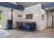 Charming bar area with seating for six and a unique display of spirits at 741 Sinai Cir, Hillsborough, NC 27278