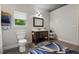 Bathroom with dark wood vanity, modern fixtures, and ample storage at 741 Sinai Cir, Hillsborough, NC 27278