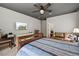 Spacious bedroom with a ceiling fan, TV, and ample natural light at 741 Sinai Cir, Hillsborough, NC 27278