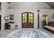 Spacious foyer with high ceilings, double front doors and neutral walls creating an open and welcoming atmosphere at 741 Sinai Cir, Hillsborough, NC 27278