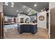 Open kitchen with blue island, eat-in seating, and access to an open concept living space at 741 Sinai Cir, Hillsborough, NC 27278