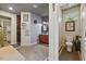 Open bathroom with a double vanity, a shower, and a separate toilet room at 741 Sinai Cir, Hillsborough, NC 27278