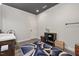 Spacious room featuring a vanity and a decorative area rug at 741 Sinai Cir, Hillsborough, NC 27278