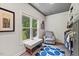 Well-organized walk-in closet with window seat, custom shelving and clothing racks for optimal storage at 741 Sinai Cir, Hillsborough, NC 27278