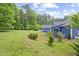 Expansive backyard featuring lush greenery and a tranquil atmosphere at 741 Sinai Cir, Hillsborough, NC 27278