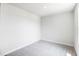 Simple bedroom with neutral walls and carpet; a blank canvas for personalization at 75 Springwood Ln, Franklinton, NC 27525