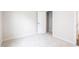 Bedroom with neutral carpet, white door, and closet storage at 75 Springwood Ln, Franklinton, NC 27525