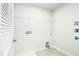 Laundry room featuring a wire rack shelf for storage at 75 Springwood Ln, Franklinton, NC 27525
