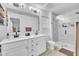Bathroom boasts a large double sink vanity, a toilet, and tiled walk-in shower at 81 Paperwhite Pl # 213, Clayton, NC 27527