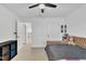 Well-lit bedroom featuring a daybed, a bookshelf, and a view into the hall at 81 Paperwhite Pl # 213, Clayton, NC 27527