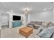 Upstairs living room features a flat screen tv and comfortable seating area at 81 Paperwhite Pl # 213, Clayton, NC 27527