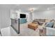 Comfortable upstairs living room with a couch and stylish furniture at 81 Paperwhite Pl # 213, Clayton, NC 27527