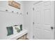 Welcoming mudroom features a bench, hooks, and storage baskets at 81 Paperwhite Pl # 213, Clayton, NC 27527