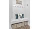 Mudroom with built-in bench, storage baskets, and stylish decor at 81 Paperwhite Pl # 213, Clayton, NC 27527
