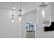 Modern kitchen featuring glass pendant lights that add elegance to the space at 81 Paperwhite Pl # 213, Clayton, NC 27527