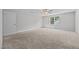Large bedroom featuring neutral carpet and a window at 834 Mamie Upchurch Rd, Lillington, NC 27546