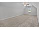 Bedroom featuring neutral carpet, ceiling fan, and natural light at 834 Mamie Upchurch Rd, Lillington, NC 27546