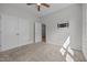 Bedroom with carpet, a mounted TV bracket, and closet space at 834 Mamie Upchurch Rd, Lillington, NC 27546