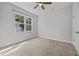 Comfortable bedroom with carpet, window view, and ample space at 834 Mamie Upchurch Rd, Lillington, NC 27546