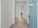 Inviting foyer showcasing the wood flooring and leading to the fireplace at 834 Mamie Upchurch Rd, Lillington, NC 27546