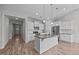 Gourmet kitchen with a large island, granite counters, and stainless appliances at 834 Mamie Upchurch Rd, Lillington, NC 27546