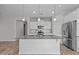 Modern kitchen featuring granite counters, stainless appliances and island at 834 Mamie Upchurch Rd, Lillington, NC 27546