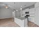 Open kitchen with granite counters, island and stainless steel appliances at 834 Mamie Upchurch Rd, Lillington, NC 27546