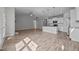 Bright, open floor plan with fireplace and views of the kitchen island at 834 Mamie Upchurch Rd, Lillington, NC 27546