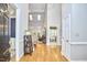 Spacious foyer with hardwood floors, offering glimpses into adjacent living spaces at 8605 Stanton Pl, Raleigh, NC 27615