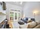 Bright living room with fireplace, skylights, and open floor plan at 8605 Stanton Pl, Raleigh, NC 27615