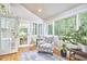 Sun room with chair and lots of windows at 8605 Stanton Pl, Raleigh, NC 27615