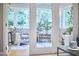 Sun room with lots of windows and view to the backyard at 8605 Stanton Pl, Raleigh, NC 27615