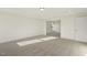 Well-lit bedroom with neutral walls and carpet, offering a blank canvas at 87 Browning Mill Dr, Wendell, NC 27591
