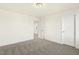 Neutral bedroom features a doorway and white door, perfect for customization at 87 Browning Mill Dr, Wendell, NC 27591
