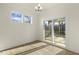 Bedroom with hardwood floors and sliding door access to screened porch providing ample natural light at 87 Browning Mill Dr, Wendell, NC 27591