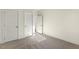 Bright bedroom with neutral walls, carpeted floors, and ample closet space at 87 Browning Mill Dr, Wendell, NC 27591