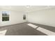 Spacious bedroom featuring recessed lighting, crown molding, and neutral carpet at 87 Browning Mill Dr, Wendell, NC 27591