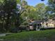 Charming single-story home with mature trees and lush green lawn at 8812 Valley Hill Ct, Apex, NC 27539