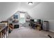 Bedroom or bonus room with sloped ceiling and carpeted floor at 9300 Glendora Ct, Garner, NC 27529