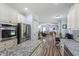 Spacious kitchen featuring granite countertops, white cabinets, stainless appliances, and open layout at 9300 Glendora Ct, Garner, NC 27529