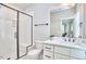 Modern bathroom with a glass-enclosed shower, sleek vanity, and contemporary fixtures at 941 W Club Blvd, Durham, NC 27701